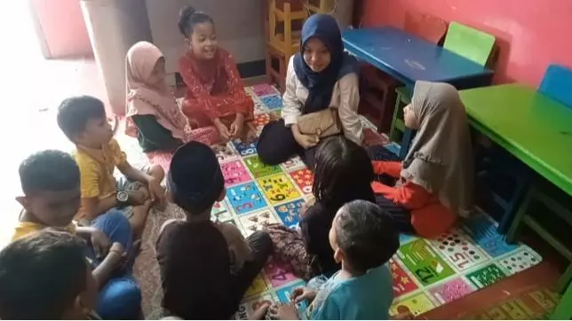 Belajar Literasi dan Memupuk Rasa Percaya Diri Anak di LSM KOPA Medan Maimun